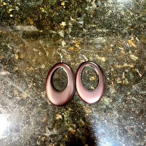 Dark faux wood hoop dangle earrings.